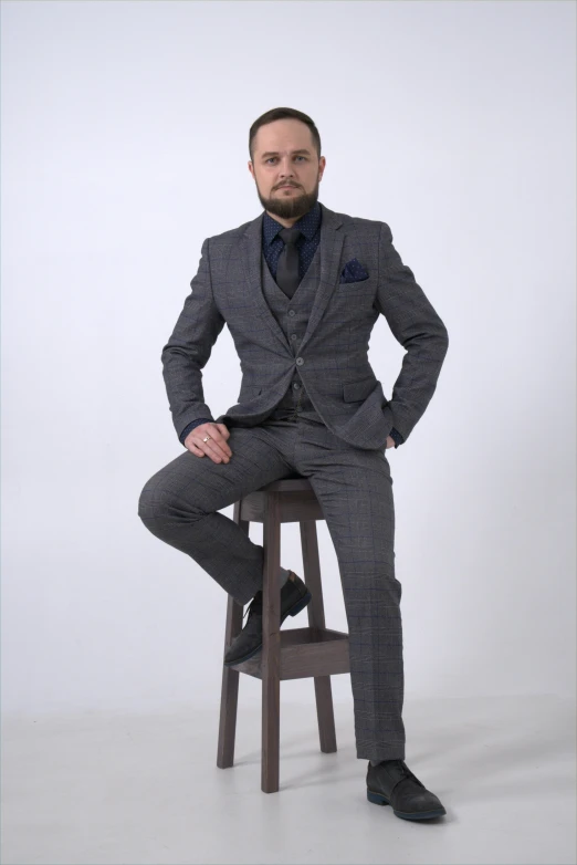 a man in a suit sitting on a stool, three piece suit, ludek pesek, full body picture, professional photo-n 3