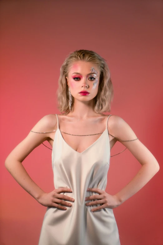 a woman in a white dress posing with her hands on her hips, an album cover, inspired by Elsa Bleda, trending on pexels, portrait of a teen robot, red contact lenses, fashion shoot 8k, wearing a camisole