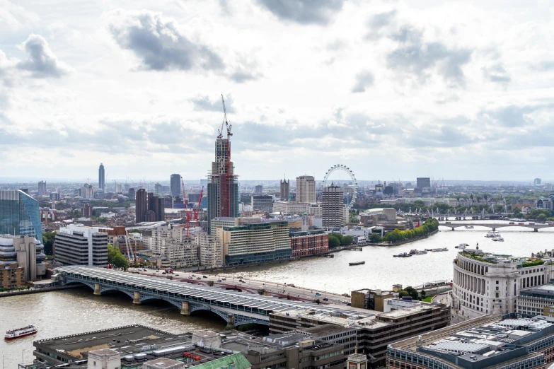 a view of london from the top of a building, by Joseph Severn, pexels contest winner, visual art, building along a river, panoramic, construction, grey