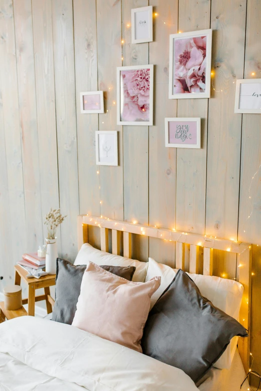 this bedroom features several lights above the bed