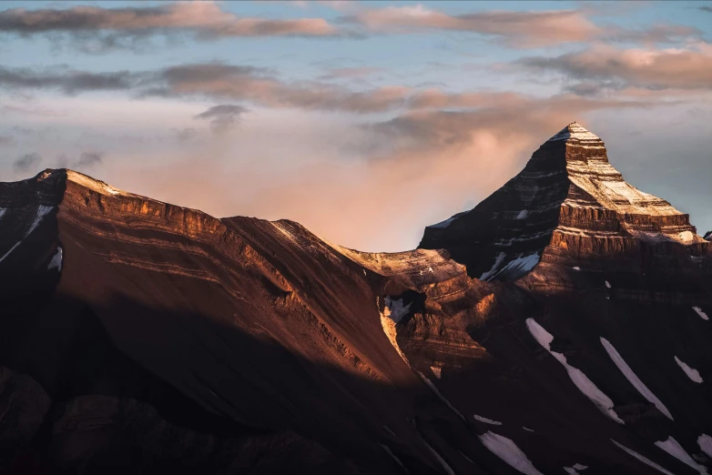 the mountain has a very tall peak on top