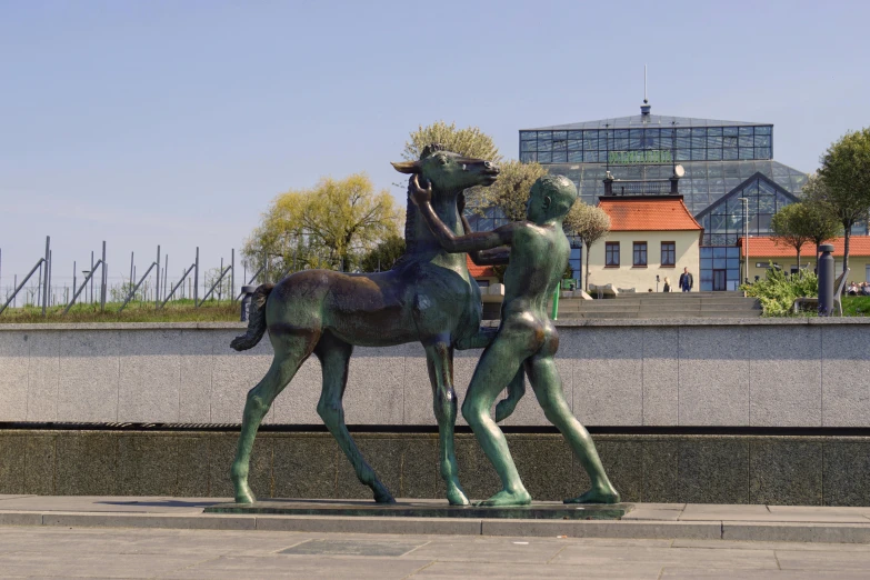 a statue of a man riding on the back of a horse, a statue, pexels contest winner, berlin secession, kissing, espoo, bronze poli, horse is up on its hind legs