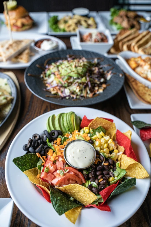 a meal including nachos and a salad