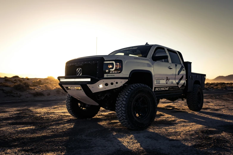 the front grille and headlights of a silver truck