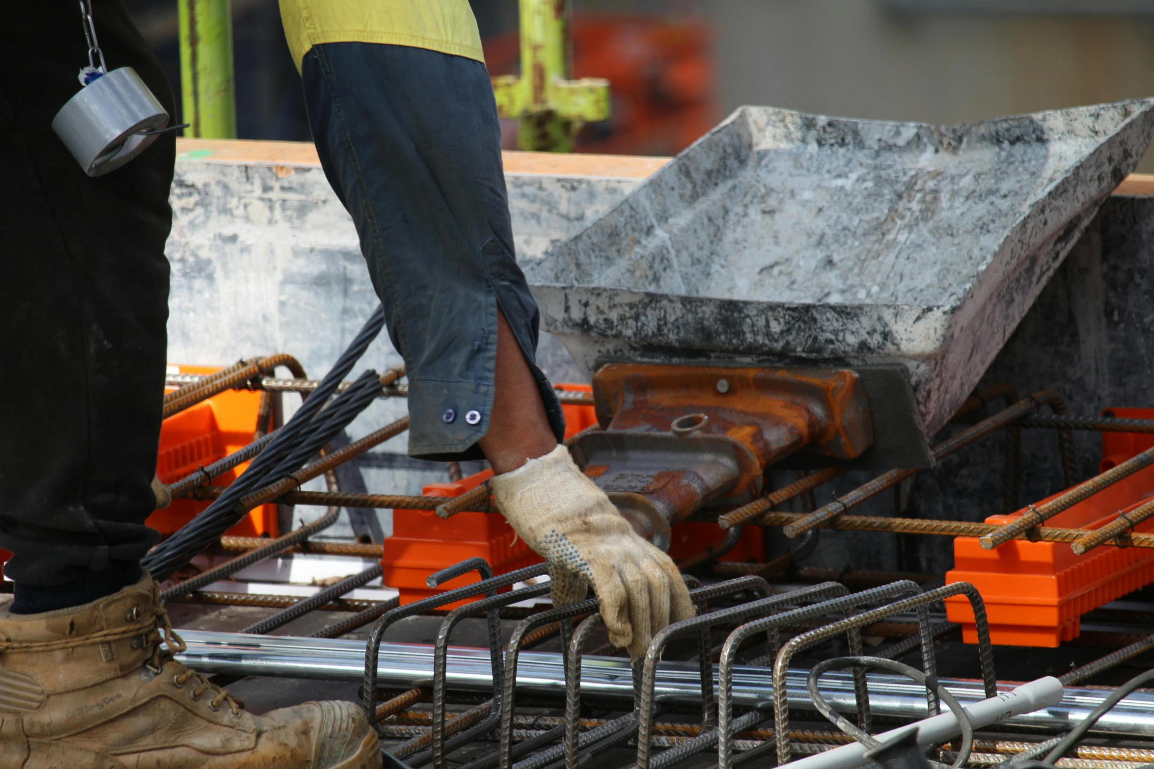 a close up of a person working at a construction site, profile image, hydraulics, rectangle, concrete