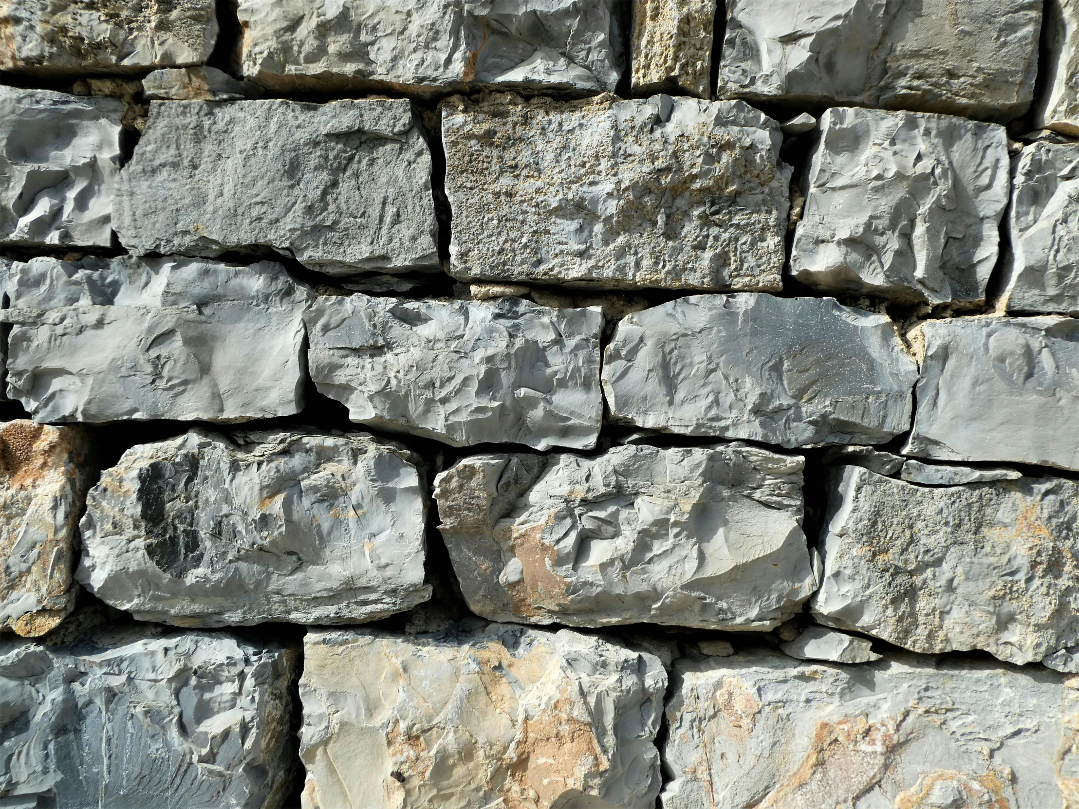 some large gray rocks stacked together