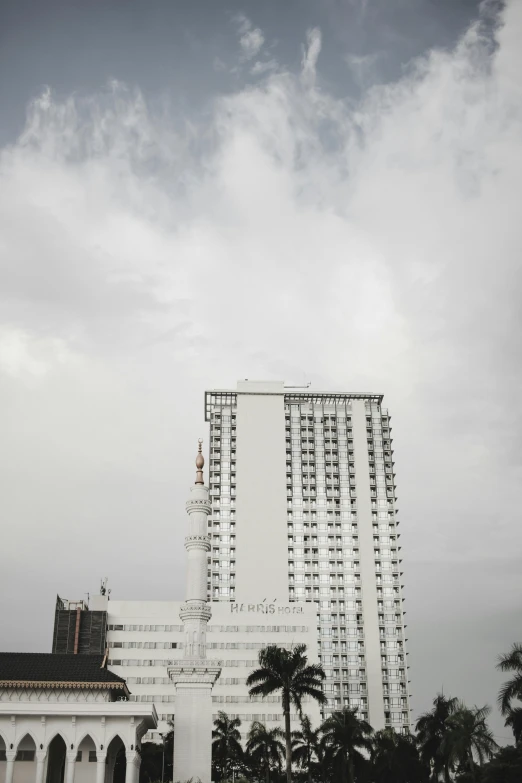 an upclose view of buildings and trees in the foreground