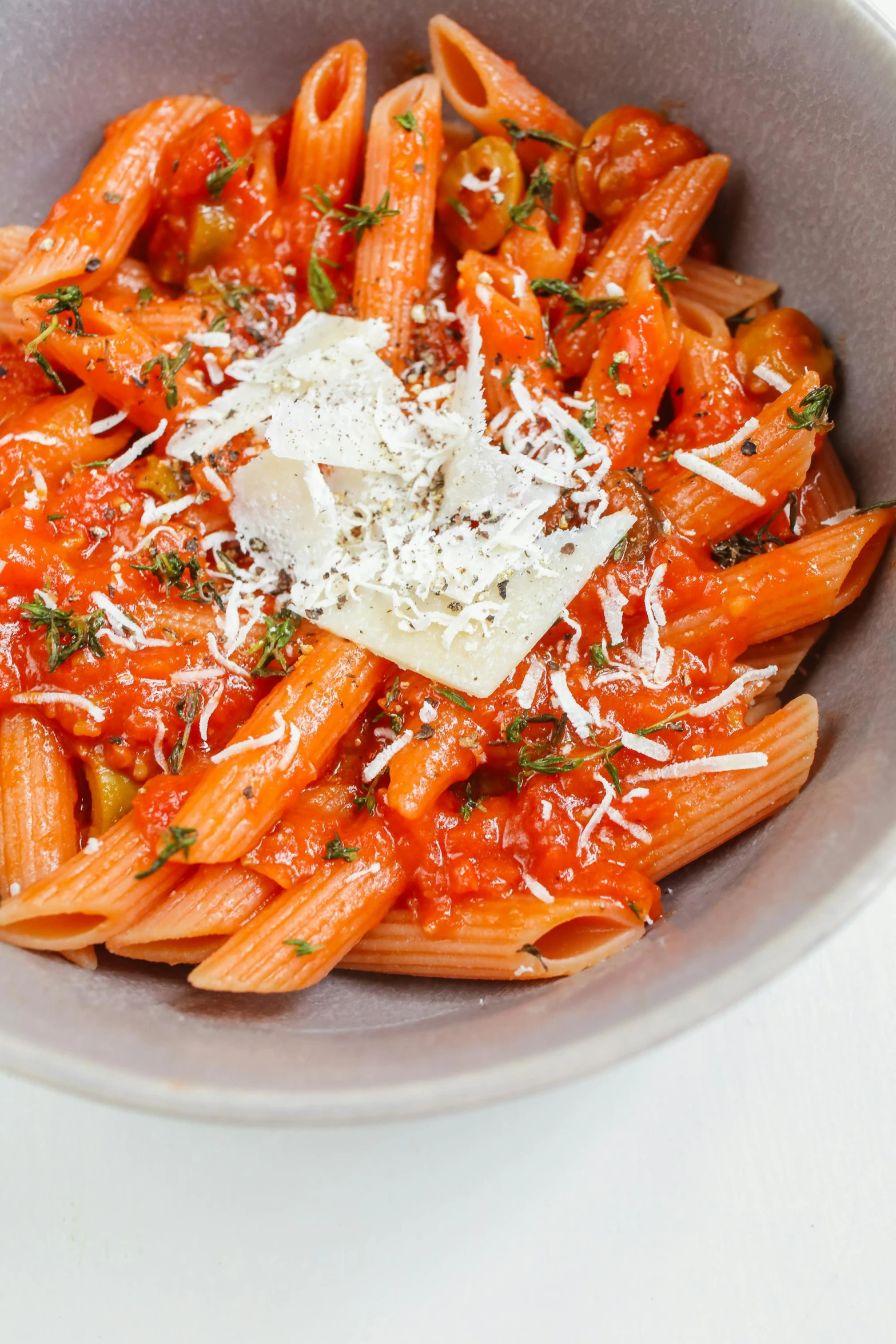 a bowl of pasta with tomato sauce and parmesan cheese, by Nicolette Macnamara, high grain, petite