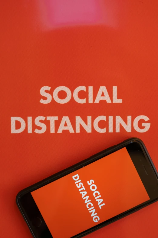 a cell phone with the words social distancing on it, by Meredith Dillman, trending on unsplash, square, michael bosanko, brown, profile image