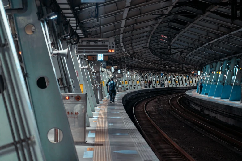 a train station with a train on the tracks, pexels contest winner, hyperrealism, tokyo futuristic and clean, people at work, random circular platforms, maintenance photo