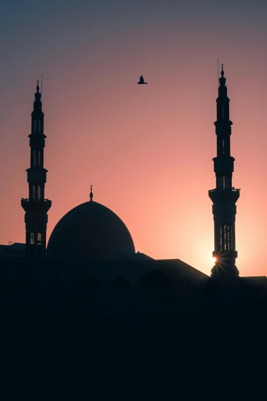 a mosque is silhouetted against the setting sun, by Ahmed Yacoubi, pexels contest winner, unilalianism, two suns, dome, full frame image