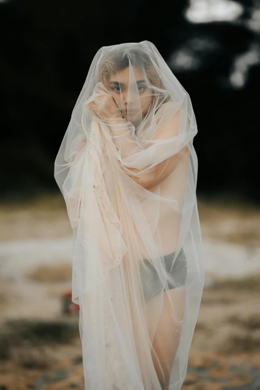an image of a woman with a veil on