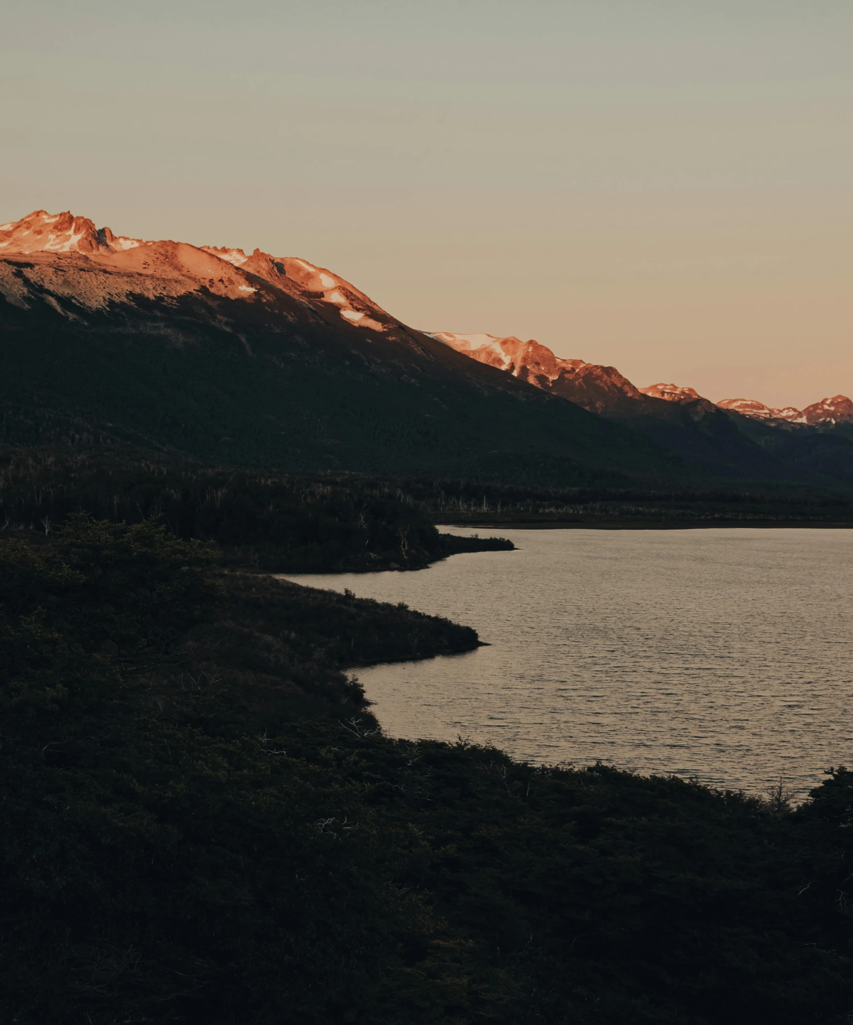 a large body of water surrounded by mountains