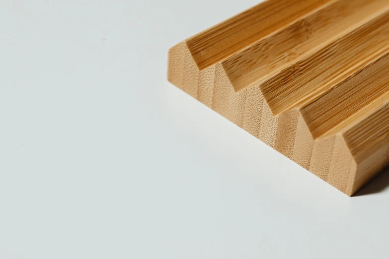 a close up of a piece of wood on a table, a picture, product view, eats bambus, staggered terraces, designer product