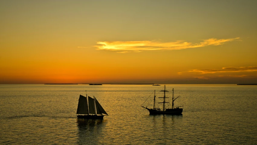 a couple of boats that are in the water, by Robert Bryden, pexels contest winner, romanticism, one piece ship sailing, day setting, tyndall rays, naples