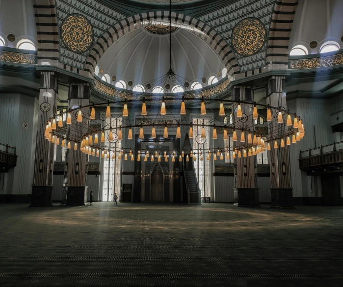 a room that has some kind of chandelier hanging from the ceiling