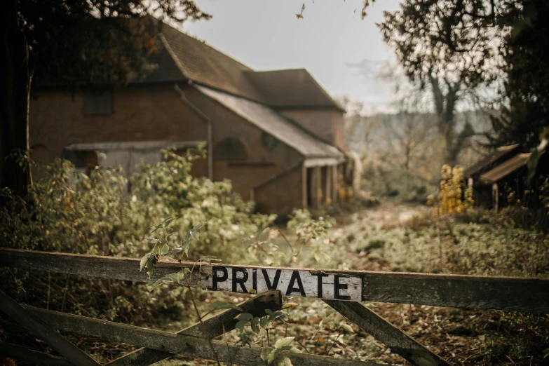 the private sign is sitting in front of the building