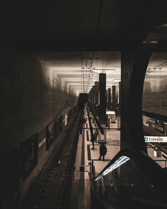 a black and white photo of a subway station, by Emma Andijewska, unsplash contest winner, beige and dark atmosphere, city view, instagram story, non-binary