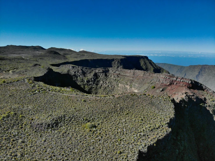 a mountain landscape has sp plants and rocks