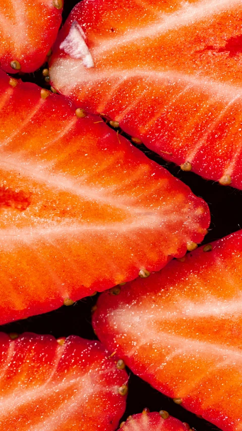 a pile of sliced strawberries sitting on top of each other, a macro photograph, pexels, art nouveau, sharp detail 8k, staggered depth), orange fluffy spines, made of glazed