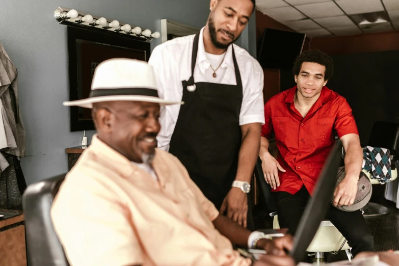 a man cutting another man's hair in a barber shop, a digital rendering, by Dan Frazier, pexels, 3 jazz musicians, family photo, looking off to the side, fan favorite