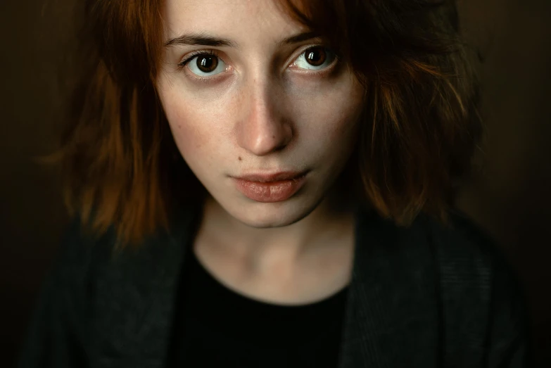 a close up of a person with red hair, a character portrait, by Adam Marczyński, pexels contest winner, short brown hair and large eyes, depressed girl portrait, high quality photo, female lead character