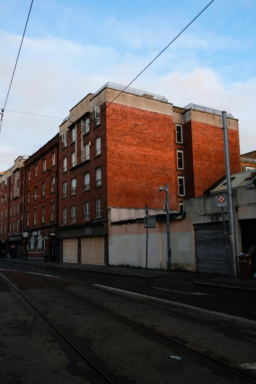 the building on the left is an apartment complex