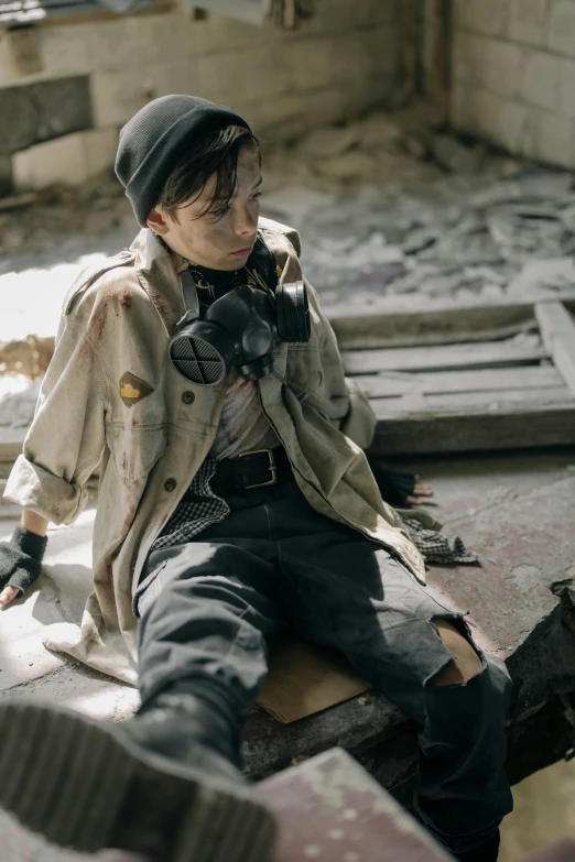 a man sitting on top of a piece of wood, a colorized photo, trending on pexels, auto-destructive art, wearing apocalyptic clothes, war boys, girls' last tour, japanese dc live-action movie