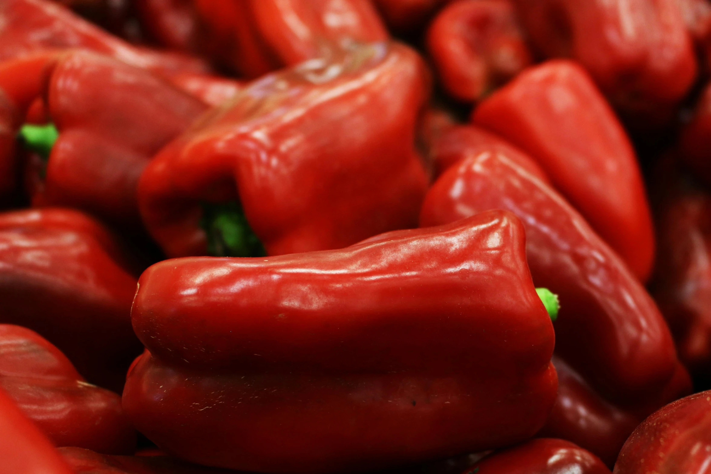 a pile of red peppers sitting on top of each other, 1 petapixel image, thumbnail, zoomed in, up close picture