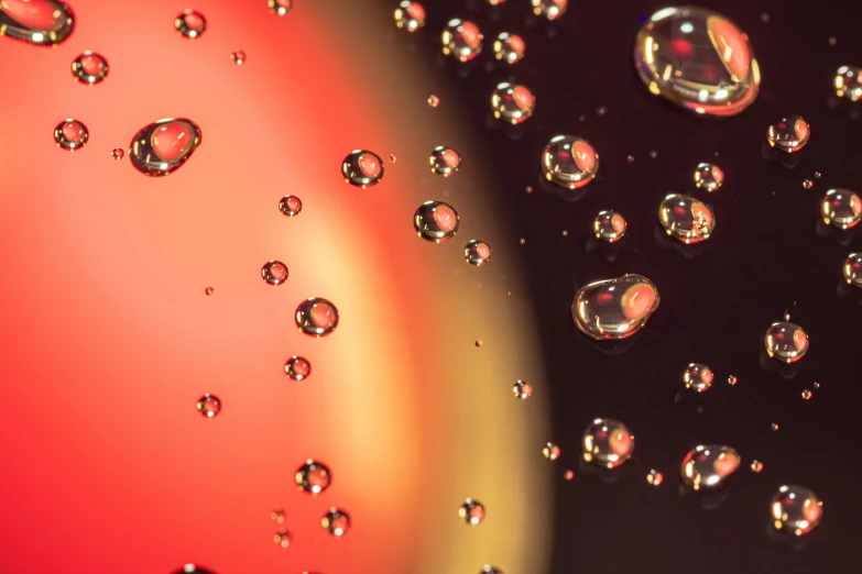a bunch of bubbles floating on top of each other, a macro photograph, by David Donaldson, pexels, art photography, gradient brown to red, reflection on the oil, close-up product photo, raytracing on
