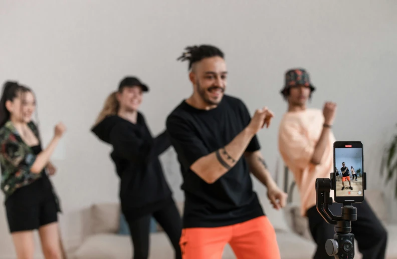 a group of people dancing in a living room, pexels contest winner, antipodeans, wearing a tracksuit, avatar image, professional image, profile image