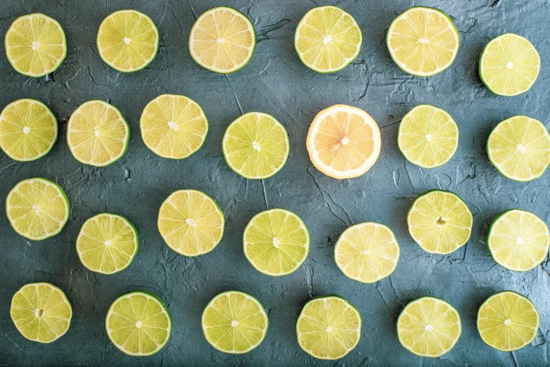 a close up of sliced lemons on a table, pexels, hyperrealism, background image, instagram picture, green neon details, thumbnail