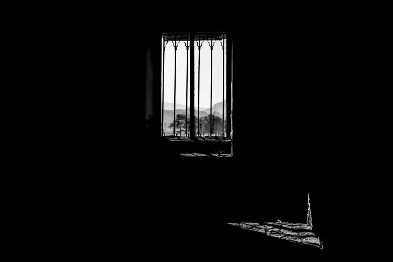 a black and white photo of a window in a dark room, by Tobias Stimmer, shadowy castle background, ffffound, dark but detailed digital art, sunrise light