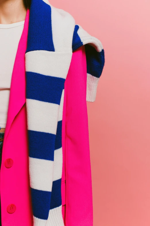 a woman holding a cell phone up to her ear, by Julia Pishtar, de stijl, pink clothes, wearing a scarf, detail shot, royal blue colors