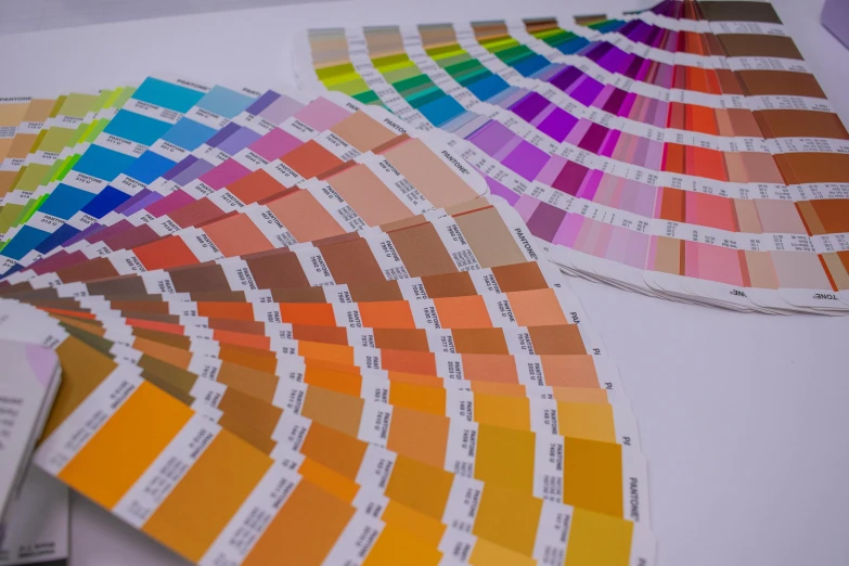 a bunch of color samples sitting on top of a table, fan favorite, a medium shot, colour, pantone