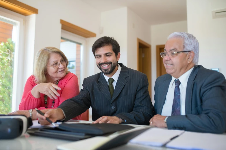 a group of people sitting around a table, professional profile photo, seu madruga, high resolution image, reassuring