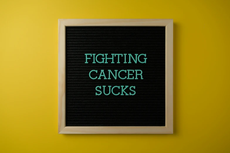 a sign that says fighting cancer sucks, shutterstock, sots art, instagram post, canva, ca, comedic
