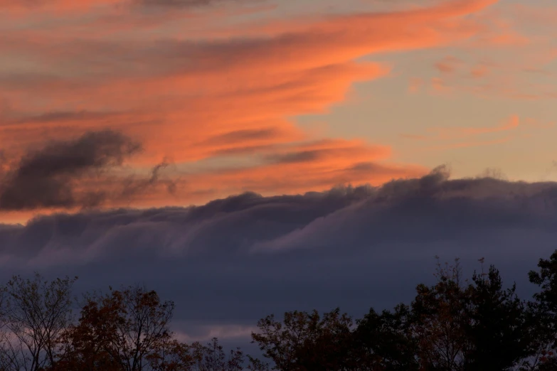 there is a plane that is flying in the sky, a portrait, inspired by Frederic Edwin Church, pexels contest winner, romanticism, autumn sunset, pink and grey clouds, today\'s featured photograph 4k, pastel palette silhouette