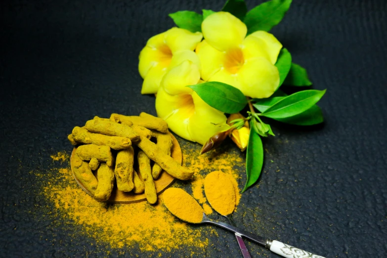 a spoon filled with tumerics next to a pile of tumerics, trending on pixabay, hurufiyya, with yellow flowers around it, hindu, promo image, ingredients on the table