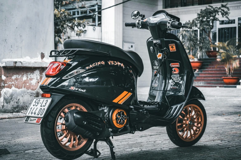 a scooter that is parked on some pavement