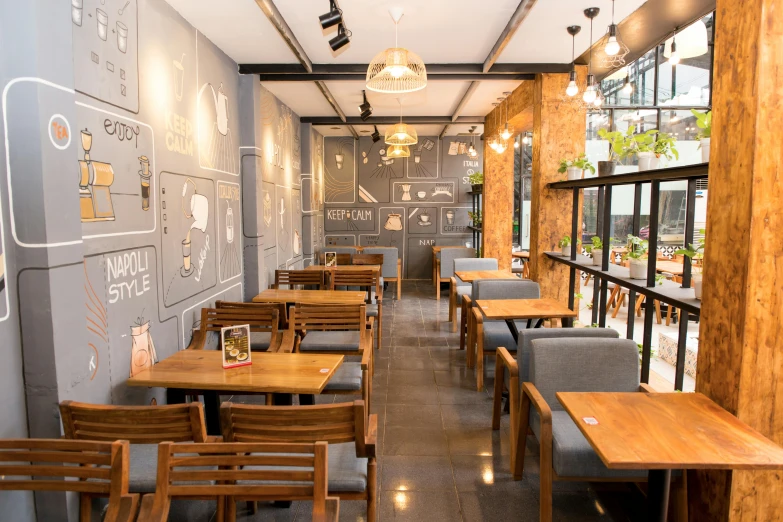 a restaurant with wooden chairs and tables on a wood floor