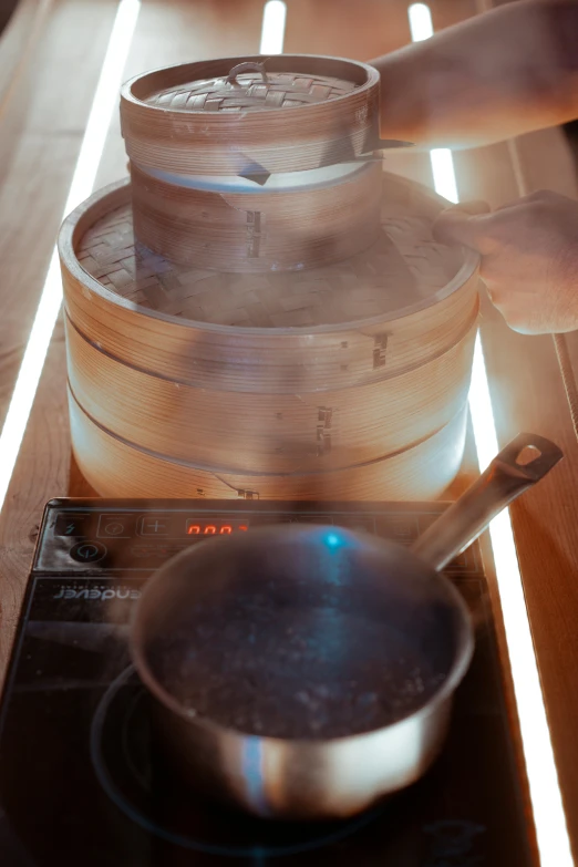 a close up of a person cooking food on a stove, onsen, gelatine silver process, bao phan, thumbnail