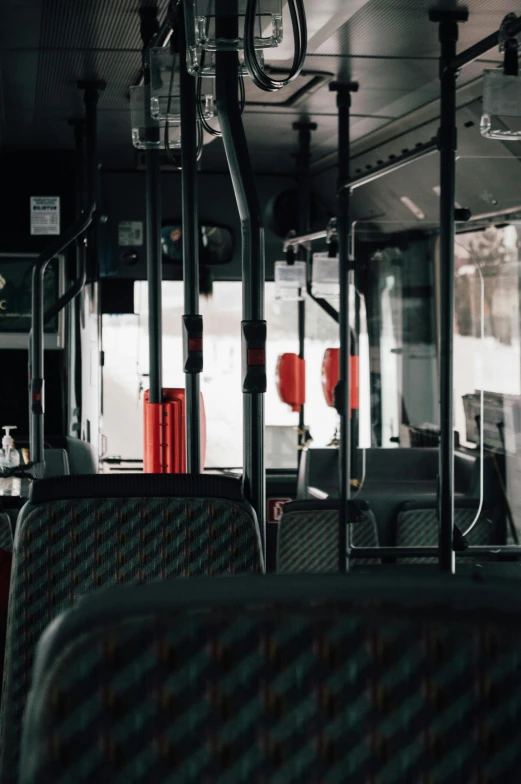 the interior of a bus with its seats down