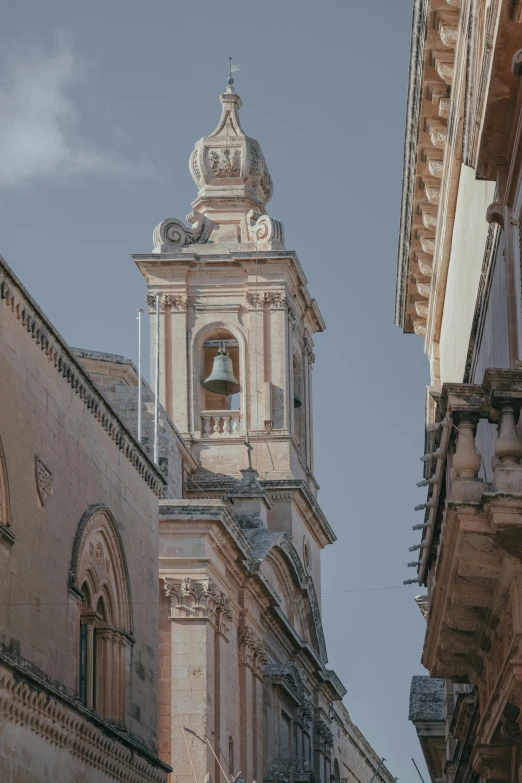 a clock that is on the side of a building, inspired by Bartolomeo Cesi, pexels contest winner, baroque, neoclassical tower with dome, apulia, low quality photo, overview