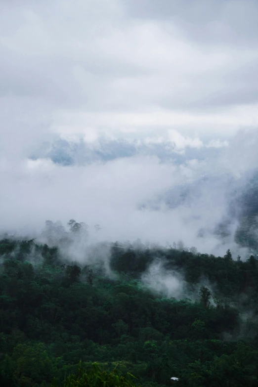 a mountain that is covered in some fog