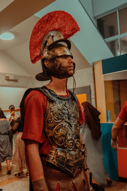 a man dressed up as a roman soldier, pexels contest winner, inside a museum, high school, ( ( theatrical ) )