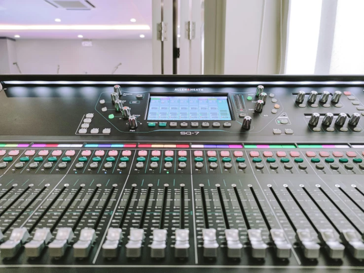 a sound board sitting on top of a table, full colour, subtle detailing, bts, sousaphones