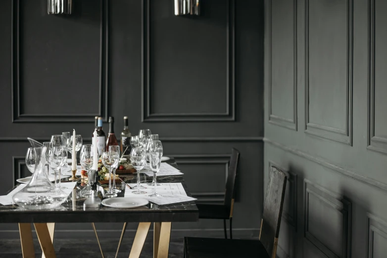 a dining room table filled with wine glasses