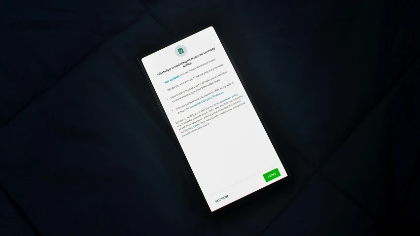 a cell phone sitting on top of a black cloth, by Android Jones, hurufiyya, dark blue and green tones, onscreen info and labels, dribbble 8k, emergency