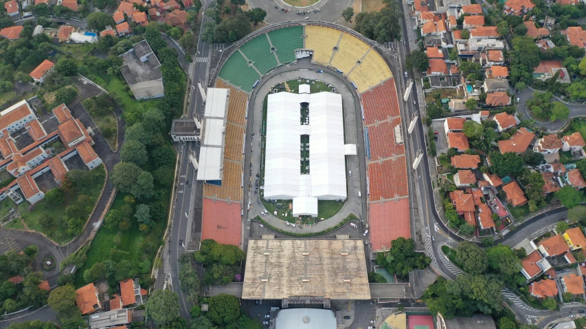 an aerial view of a tennis court in a city, by Luis Miranda, quito school, concert hall, south jakarta, 2 0 2 2, festivals